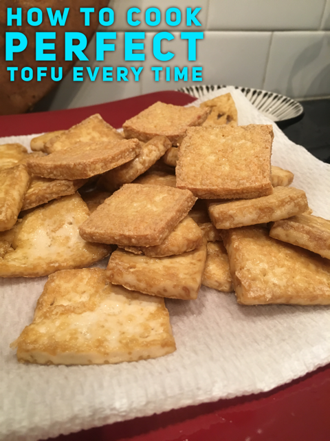 How to cook perfect tofu every time - a picture of perfectly cooked tofu in a pile on a plate.